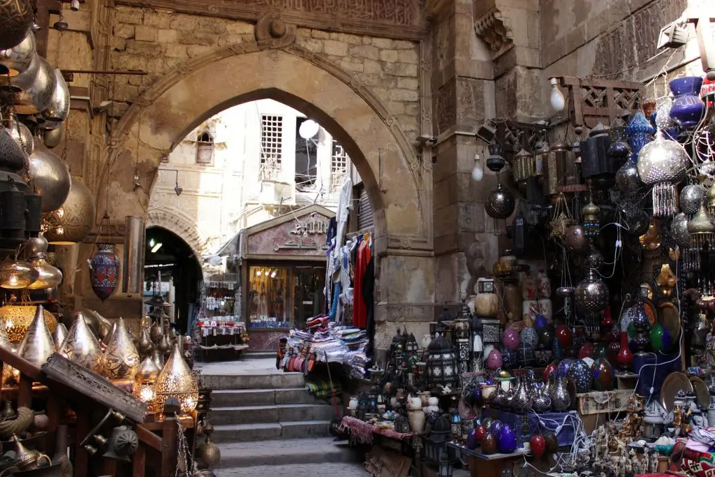 Mosque minarets and historic facades along El Moez Street in Cairo