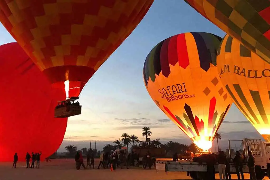 Hot air balloon launch at sunrise on Luxor West Bank