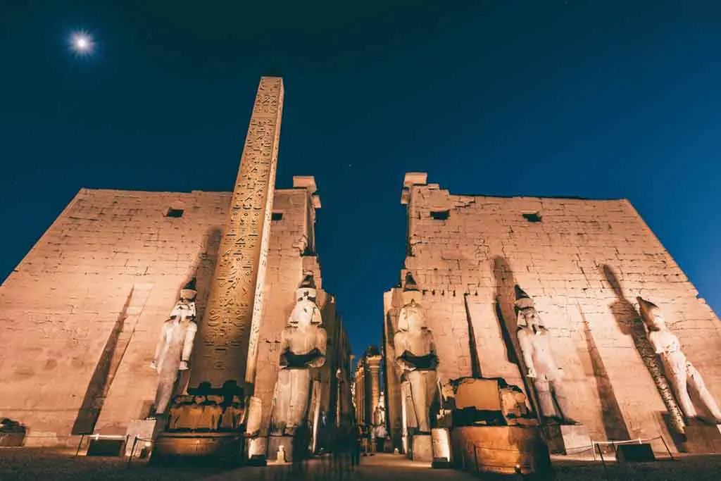 Illuminated Luxor Temple by night during a private overnight tour from Hurghada