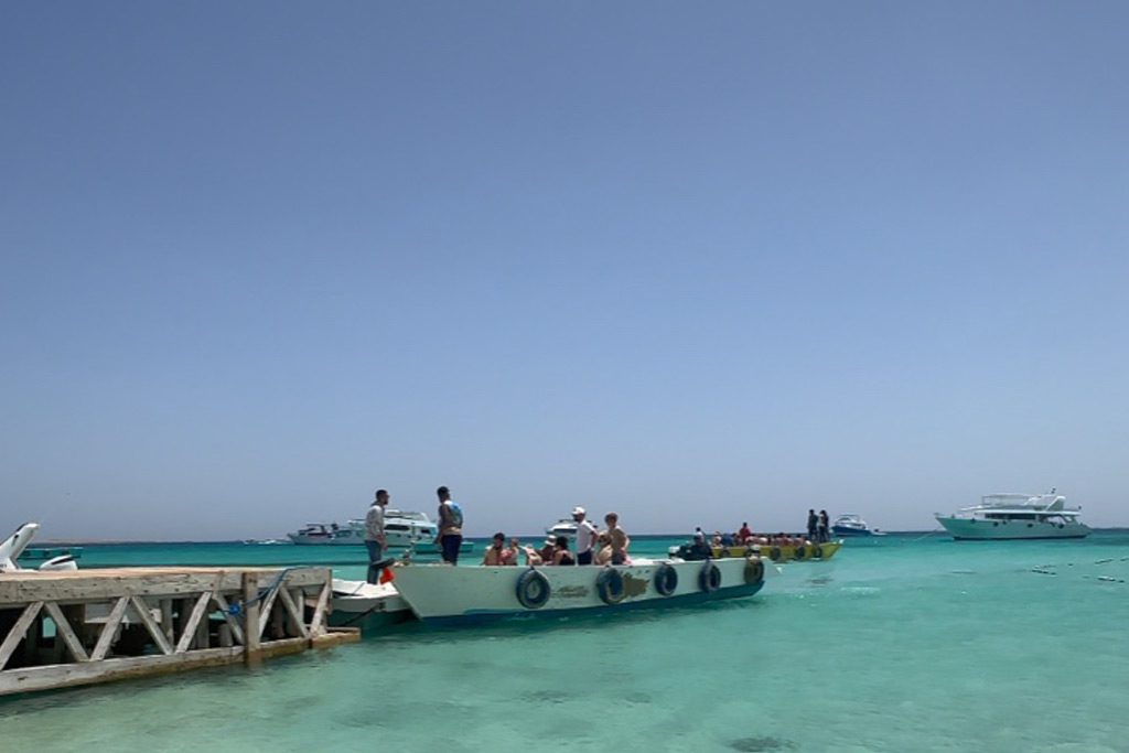 Orange Bay Island snorkeling trip from Hurghada with Red Sea coral reefs and beach time
