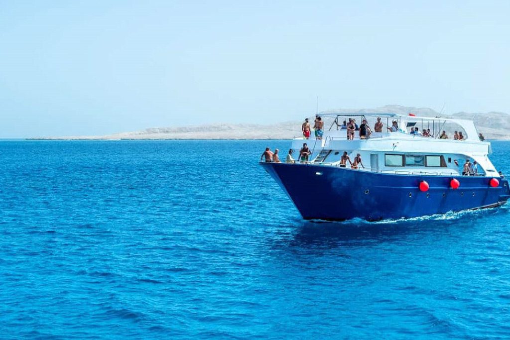 Boat trip from Hurghada to Orange Bay Island for snorkeling and beach time